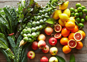 a group of fruits and vegetables on a wood surface Healthy Weight Loss Diets Portsmouth